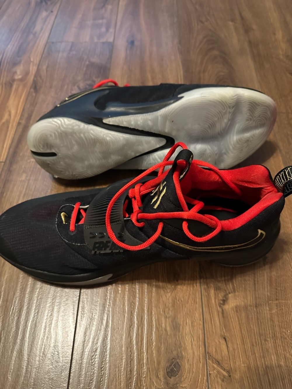 Nike Giannis “Freak” Men’s Black, Red & Gold Low-Top Sneakers